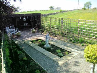 View looking North West over the Angel garden to the wild flower meadow