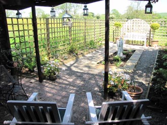 Angel garden viewed from seating area under the Loggia