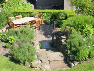 View down towards the herb garden private seating area