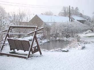 Huddlestone Cottage and The Hayloft gardens in the snow 2011