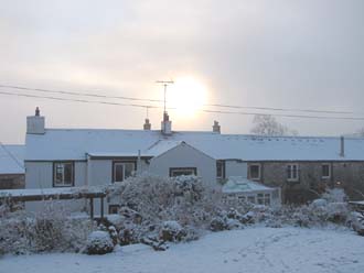 Huddlestone Cottage and The Hayloft gardens in the snow 2011