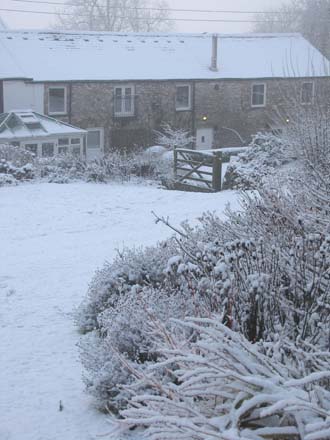 Huddlestone Cottage and The Hayloft gardens in the snow 2011