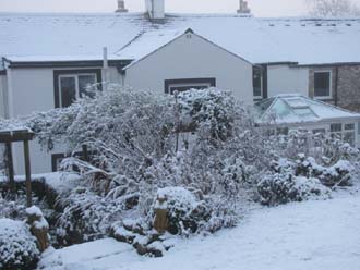 Huddlestone Cottage and The Hayloft gardens in the snow 2011