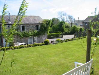 Garden view South towards Huddlestone Cottage