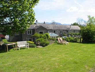 Panoramic garden view of Redmain House and Cottages