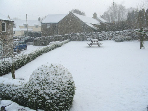 Huddlestone Cottage and The Hayloft gardens in snow February 2009