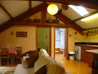 View from entrance stairs towards the bedroom and bathroom