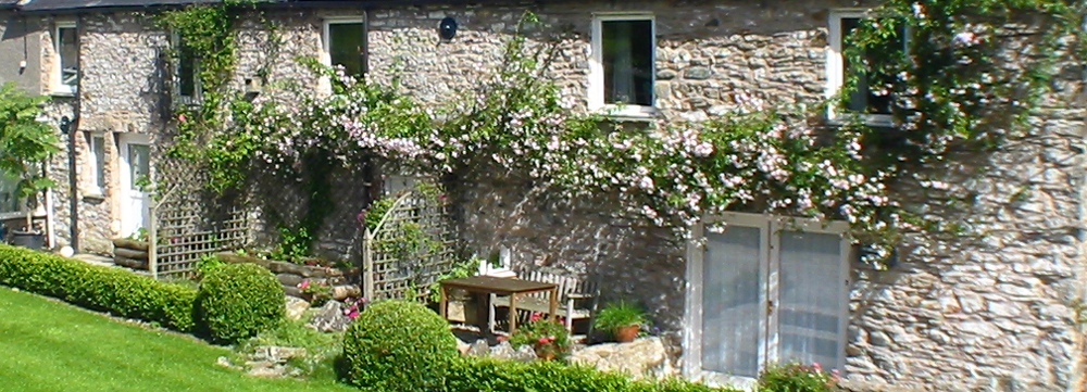 Huddlestone Cottage and The Hayloft viewed from the garden